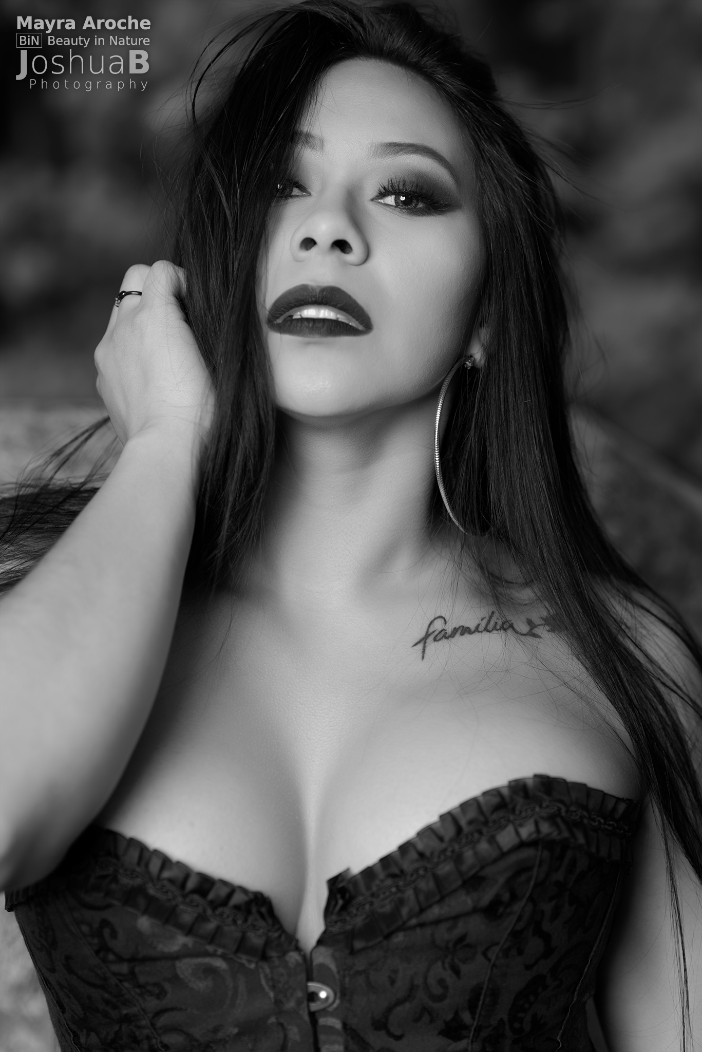 Beautiful Latina in Halloween makeup wearing black corset